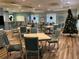 Community room with tables, chairs, and a Christmas tree at 4046 Overture Cir # 4046, Bradenton, FL 34209