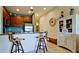 Kitchen with stainless steel appliances and wood cabinets at 4046 Overture Cir # 4046, Bradenton, FL 34209