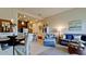 Open concept living and dining area with kitchen access at 4046 Overture Cir # 4046, Bradenton, FL 34209