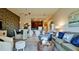 Open concept living room with a view of the kitchen and dining area at 4046 Overture Cir # 4046, Bradenton, FL 34209