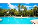 Resort-style pool with lush landscaping at 4046 Overture Cir # 4046, Bradenton, FL 34209