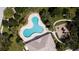 Aerial view of community pool with surrounding patio at 4046 Overture Cir # 4046, Bradenton, FL 34209
