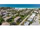 Aerial view shows multi-Gathering homes with parking and a community atmosphere close to the beach at 4255 Gulf Dr # 116, Holmes Beach, FL 34217