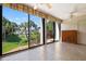 Bright Florida room with sliding glass doors offering scenic views at 4255 Gulf Dr # 116, Holmes Beach, FL 34217