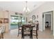 Bright kitchen with dining area and sliding glass doors leading to the backyard at 4344 Eldron Ave, North Port, FL 34286