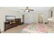 Spacious main bedroom with ensuite bathroom and ceiling fan at 4344 Eldron Ave, North Port, FL 34286