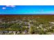 Elevated view of residential area showing several homes, streets, and trees at 4344 Eldron Ave, North Port, FL 34286