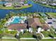 Aerial view of community pool, playground, and clubhouse at 4689 Cedron Ct, Sarasota, FL 34240