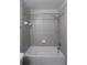 Bathroom with shower/tub combo and gray tile at 4850 51St W St # 8104, Bradenton, FL 34210