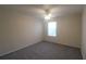 Bright bedroom with ceiling fan and window at 4850 51St W St # 8104, Bradenton, FL 34210