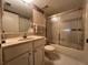 Clean bathroom includes a shower/tub combo and updated vanity at 5171 Willow Links # 23, Sarasota, FL 34235