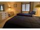 Guest bedroom with two twin beds and ample closet space at 5171 Willow Links # 23, Sarasota, FL 34235