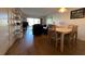 Bright dining area with wood flooring and seating for four at 5171 Willow Links # 23, Sarasota, FL 34235