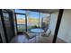 Enclosed patio overlooking a serene lake view at 5171 Willow Links # 23, Sarasota, FL 34235