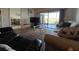 Spacious living room with comfortable seating and patio access at 5171 Willow Links # 23, Sarasota, FL 34235