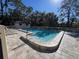 Community pool with patio and lounge chairs at 5171 Willow Links # 23, Sarasota, FL 34235