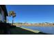 Peaceful lake view with palm trees at 5171 Willow Links # 23, Sarasota, FL 34235