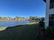 Lovely view of lake and landscape at 5171 Willow Links # 23, Sarasota, FL 34235