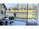 Screened balcony with serene water views at 5613 Key Largo Ct, Bradenton, FL 34203