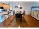 Dining area with hardwood floors, adjacent to the kitchen at 5613 Key Largo Ct, Bradenton, FL 34203