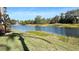 Community lake with fountain and lush landscaping at 5613 Key Largo Ct, Bradenton, FL 34203