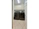 Laundry room with black Samsung washer and dryer at 5613 Key Largo Ct, Bradenton, FL 34203