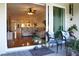 Patio with sliding glass doors leading to the living room at 5613 Key Largo Ct, Bradenton, FL 34203
