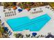 Community pool with plenty of lounge chairs and umbrellas at 5780 Midnight Pass Rd # 205, Sarasota, FL 34242