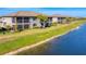 Luxury condos near lake and lush landscaping at 6035 Worsham Ln # 104, Lakewood Ranch, FL 34211