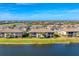 Community overview, featuring lakefront properties and golf course at 6035 Worsham Ln # 104, Lakewood Ranch, FL 34211