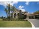Mediterranean-style clubhouse with arched entryways and palm trees at 6035 Worsham Ln # 104, Lakewood Ranch, FL 34211