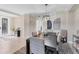 Elegant dining room featuring a dark wood table and neutral decor at 6035 Worsham Ln # 104, Lakewood Ranch, FL 34211