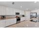 Well-equipped kitchen with stainless steel appliances and granite counters at 6035 Worsham Ln # 104, Lakewood Ranch, FL 34211