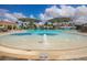 Stunning resort pool with a sandy beach entry at 6035 Worsham Ln # 104, Lakewood Ranch, FL 34211