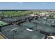 Aerial view of multiple tennis courts at 6035 Worsham Ln # 104, Lakewood Ranch, FL 34211