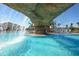 Stunning waterfall feature adjacent to the pool at 6035 Worsham Ln # 104, Lakewood Ranch, FL 34211