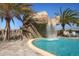 Relaxing waterfall feature cascading into the pool at 6035 Worsham Ln # 104, Lakewood Ranch, FL 34211