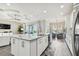 View of the kitchen and living area, showcasing the open floor plan and modern design at 6227 Anise Dr, Sarasota, FL 34238