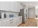 Modern kitchen with white cabinets and stainless steel appliances at 6720 Wild Lake Ter, Bradenton, FL 34212