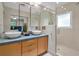 Modern bathroom with double vanity and walk-in shower at 7739 Westmoreland Dr, Sarasota, FL 34243