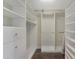 Large walk-in closet with ample shelving and hanging space at 8110 Grand Estuary Trl # 104, Bradenton, FL 34212