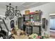 Large garage with workbench, storage cabinets, and plenty of space at 11265 Mc Dermott Ct, Englewood, FL 34223
