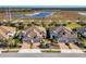 Aerial view of homes, preserve, and natural landscape at 11265 Mc Dermott Ct, Englewood, FL 34223