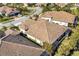 Aerial view of home and neighborhood with tile roofs at 11265 Mc Dermott Ct, Englewood, FL 34223