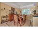 Elegant dining room with a chandelier and hardwood floors at 1718 Hillview St, Sarasota, FL 34239