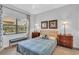 Cozy bedroom with a comfortable bed, stylish nightstands, and natural light at 1720 Starling Dr # 103, Sarasota, FL 34231