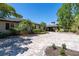 Paved driveway and lush landscaping lead to the community entrance at 1720 Starling Dr # 103, Sarasota, FL 34231