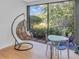 Relaxing patio area with comfortable seating and serene backyard views at 1720 Starling Dr # 103, Sarasota, FL 34231