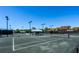 Community tennis courts with covered seating area at 1720 Starling Dr # 103, Sarasota, FL 34231