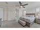 Main bedroom with king-size bed and ensuite bathroom at 17507 Polo Trl, Bradenton, FL 34211